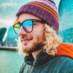 Firefly portrait of a futuristic berlin man in a beanie hat and glasses, -apocalyptic- 27263 (1)
